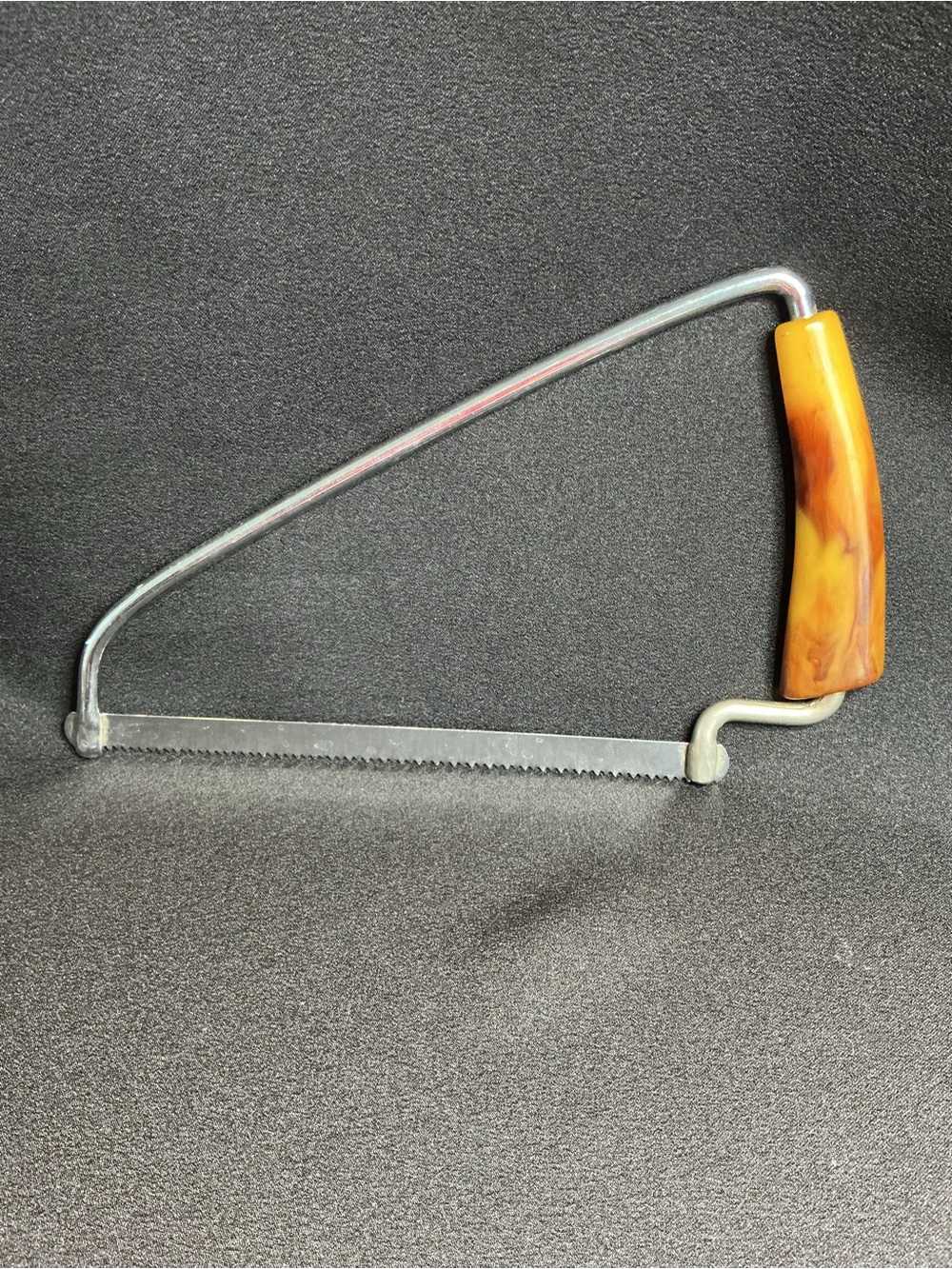 Mid Century Sheffield Small Bone and Meat Saw with Butterscotch Bakelite Handle